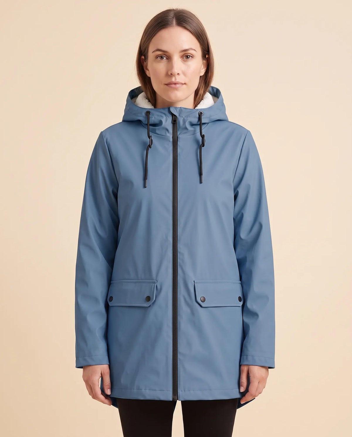 Women's lined hooded coat in blue – front view with zip fastening and flap pockets