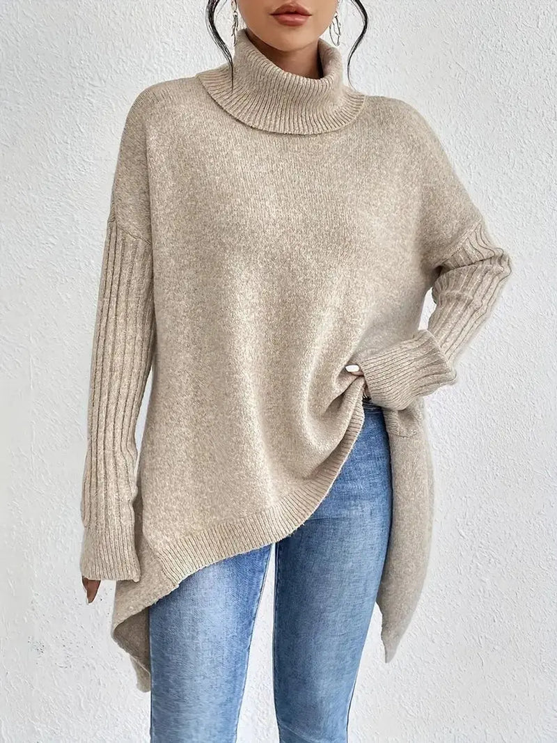 Women's oversized longline ribbed turtleneck sweater in beige - standing view