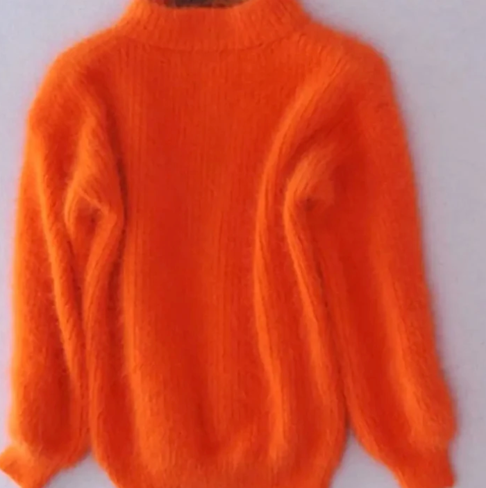 Women's fluffy turtleneck loose knit sweater in orange
