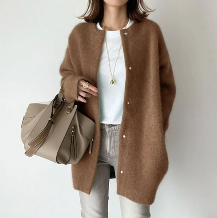 Women's oversized cardigan in brown - studio view