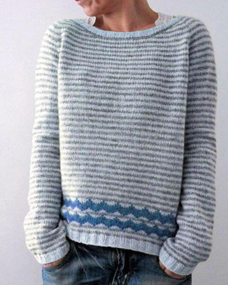 Gray striped crew neck sweater with blue zigzag hem