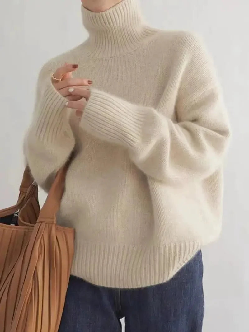 Women's oversized turtleneck knit sweater in beige