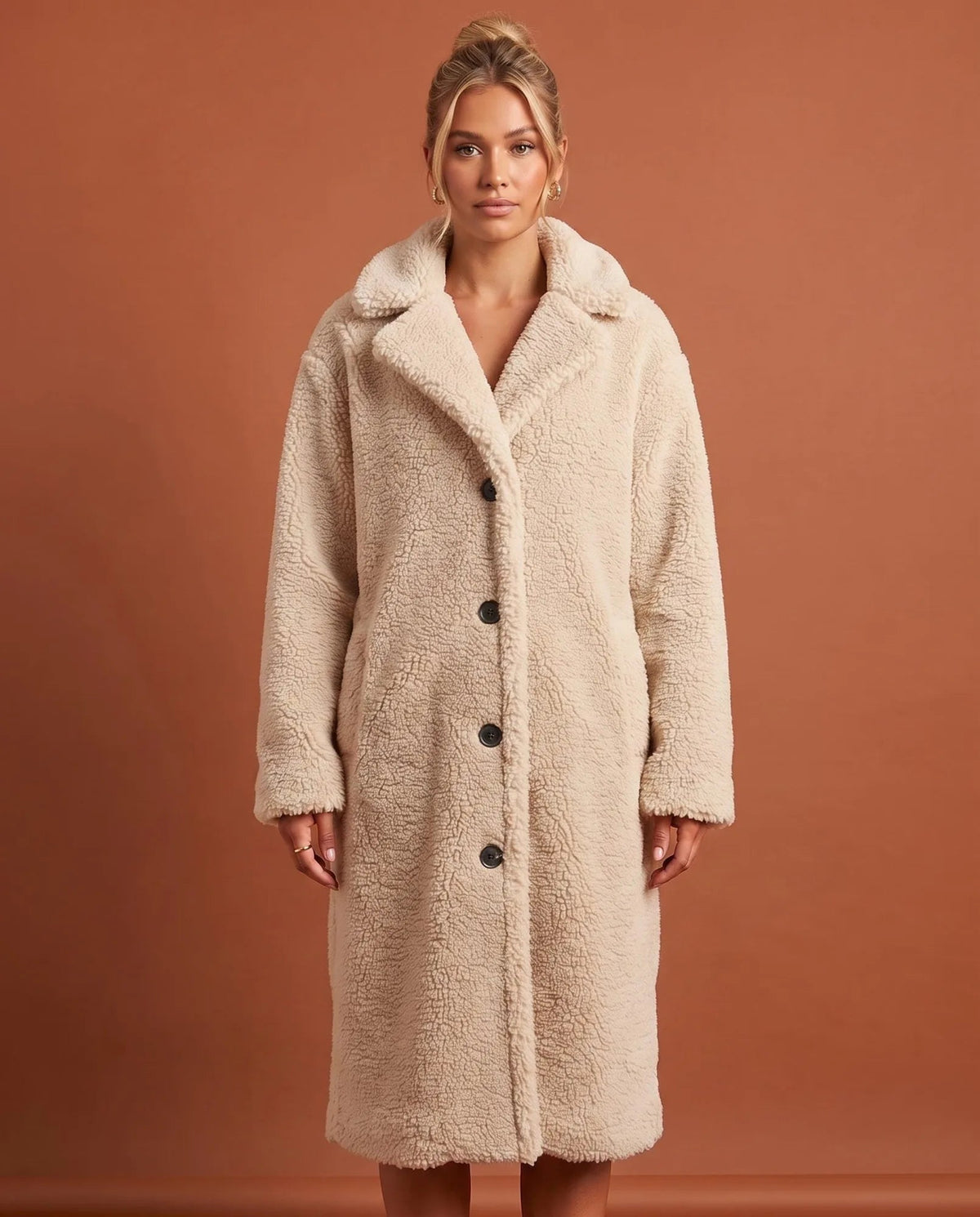 Women's white longline teddy fleece coat with notched collar and button front, front view