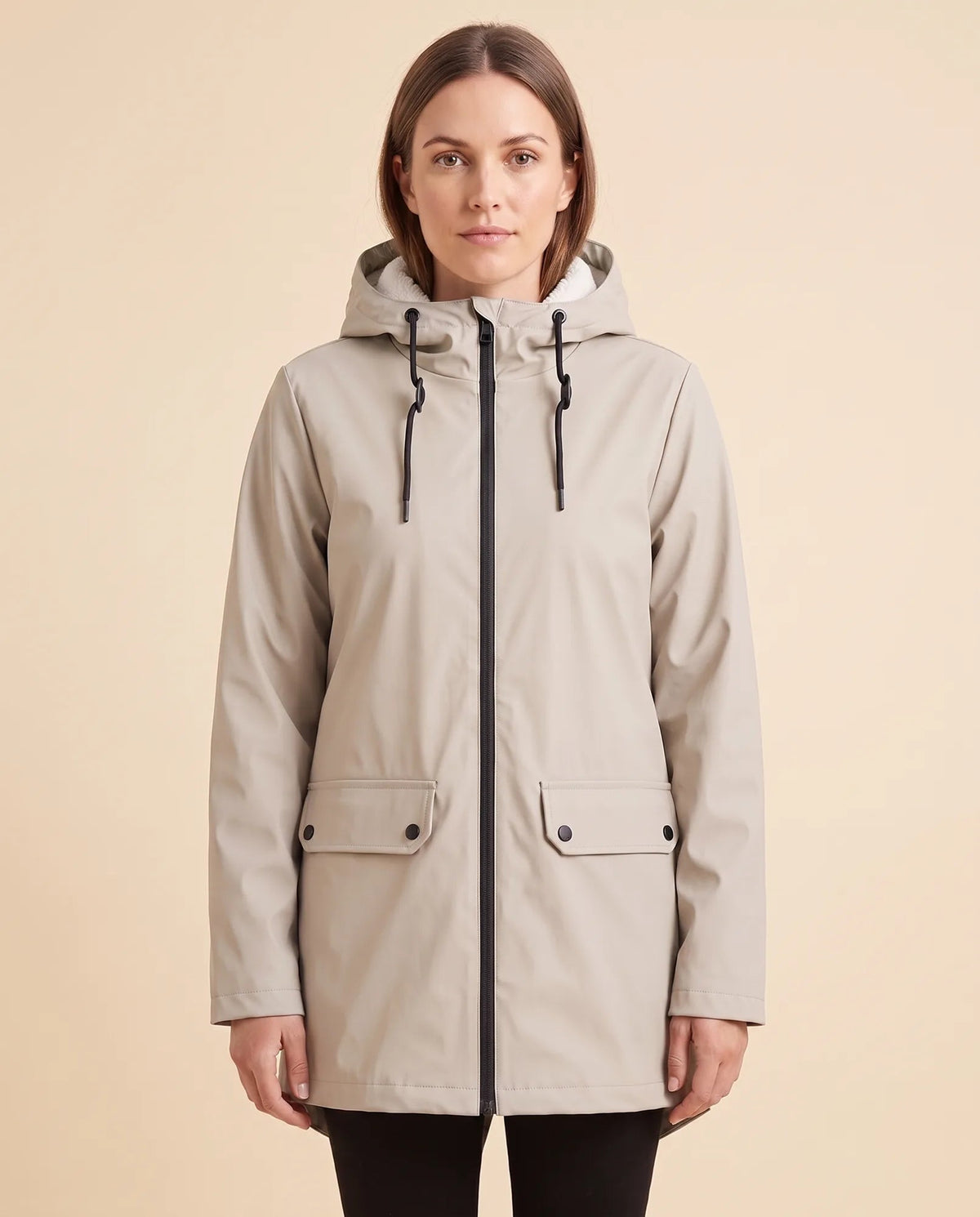 Women's lined hooded coat in beige – front view with zip fastening and flap pockets