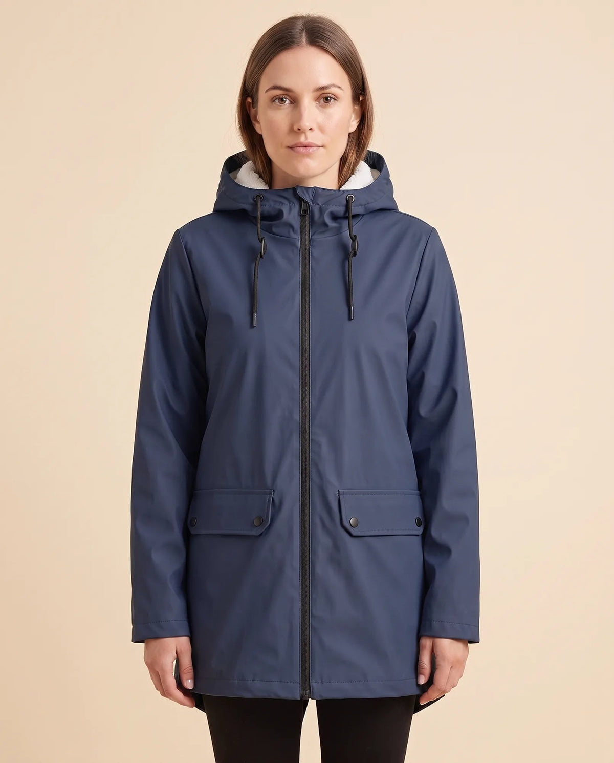 Women's lined hooded coat in navy – front view with zip fastening and flap pockets