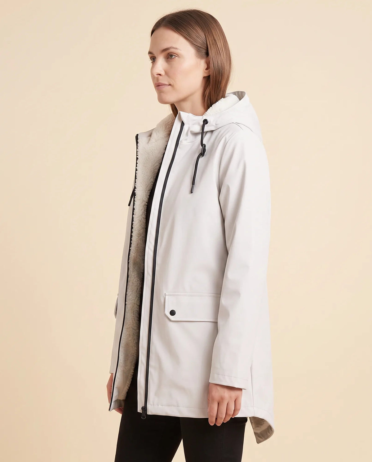 Women's lined hooded coat in white – angled view showing the coat silhouette