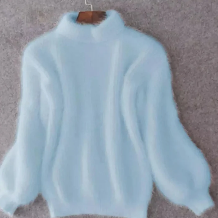 Women's fluffy turtleneck loose knit sweater in blue