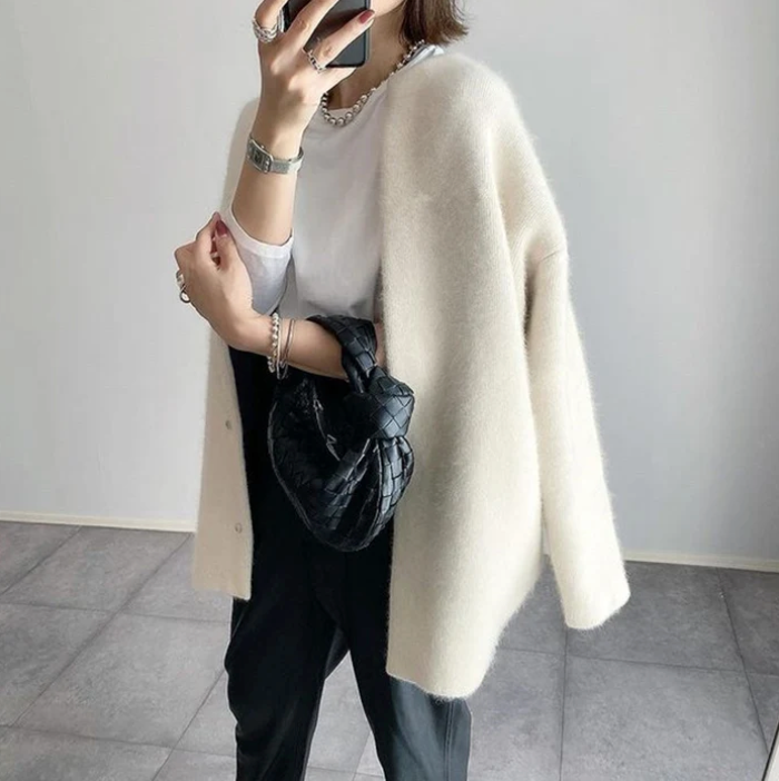 Women's oversized cardigan in white - side view