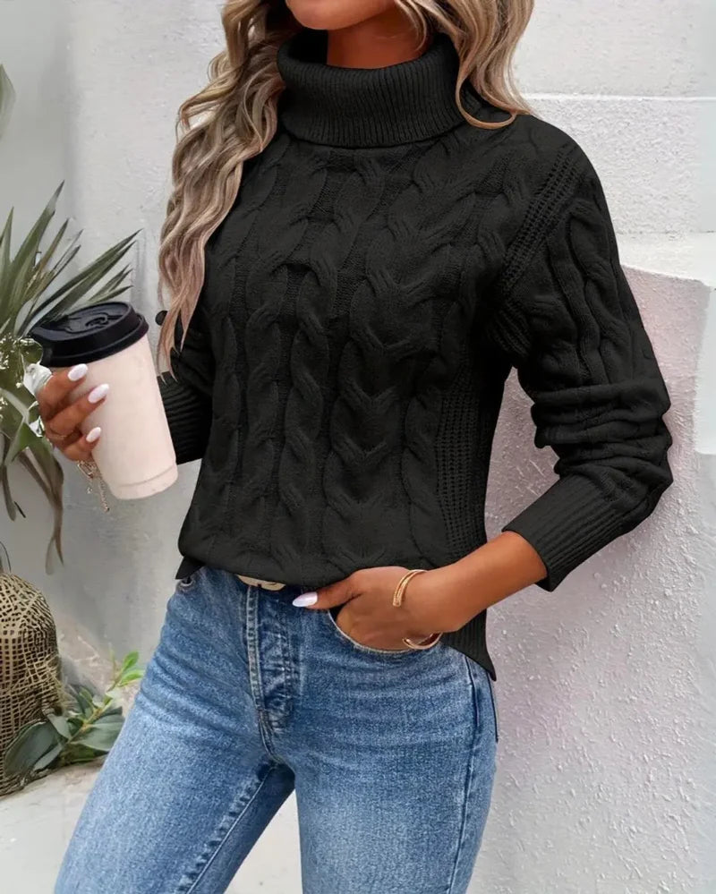 Women's cable knit turtleneck sweater in black