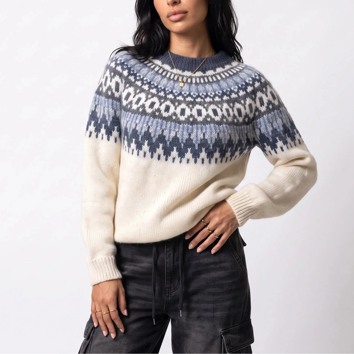 Cream crew neck sweater with blue Nordic-inspired yoke